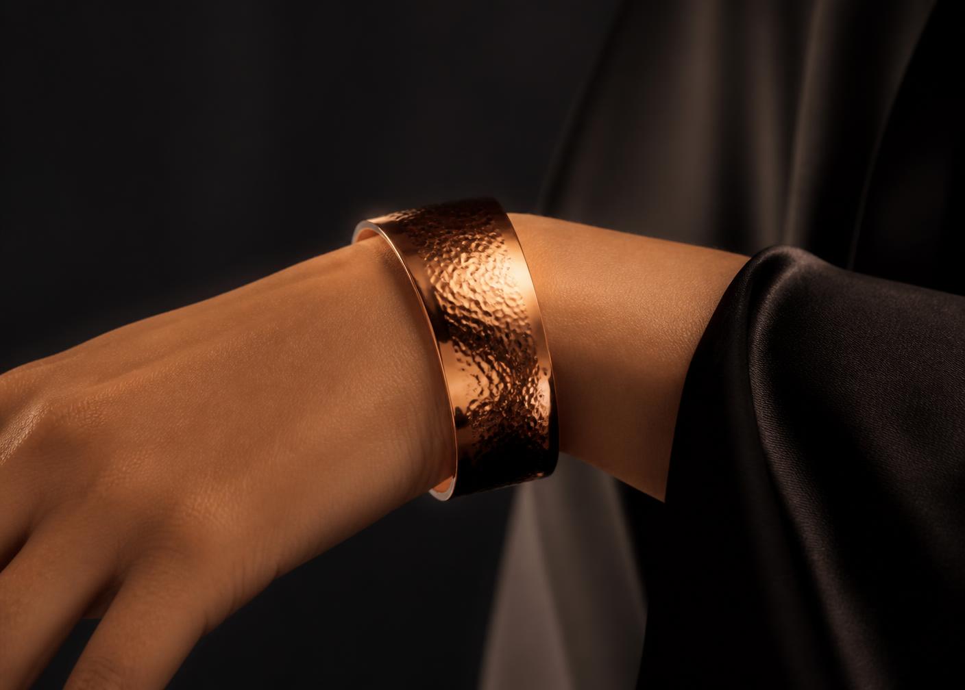 Copper cuff bracelet worn on the wrist